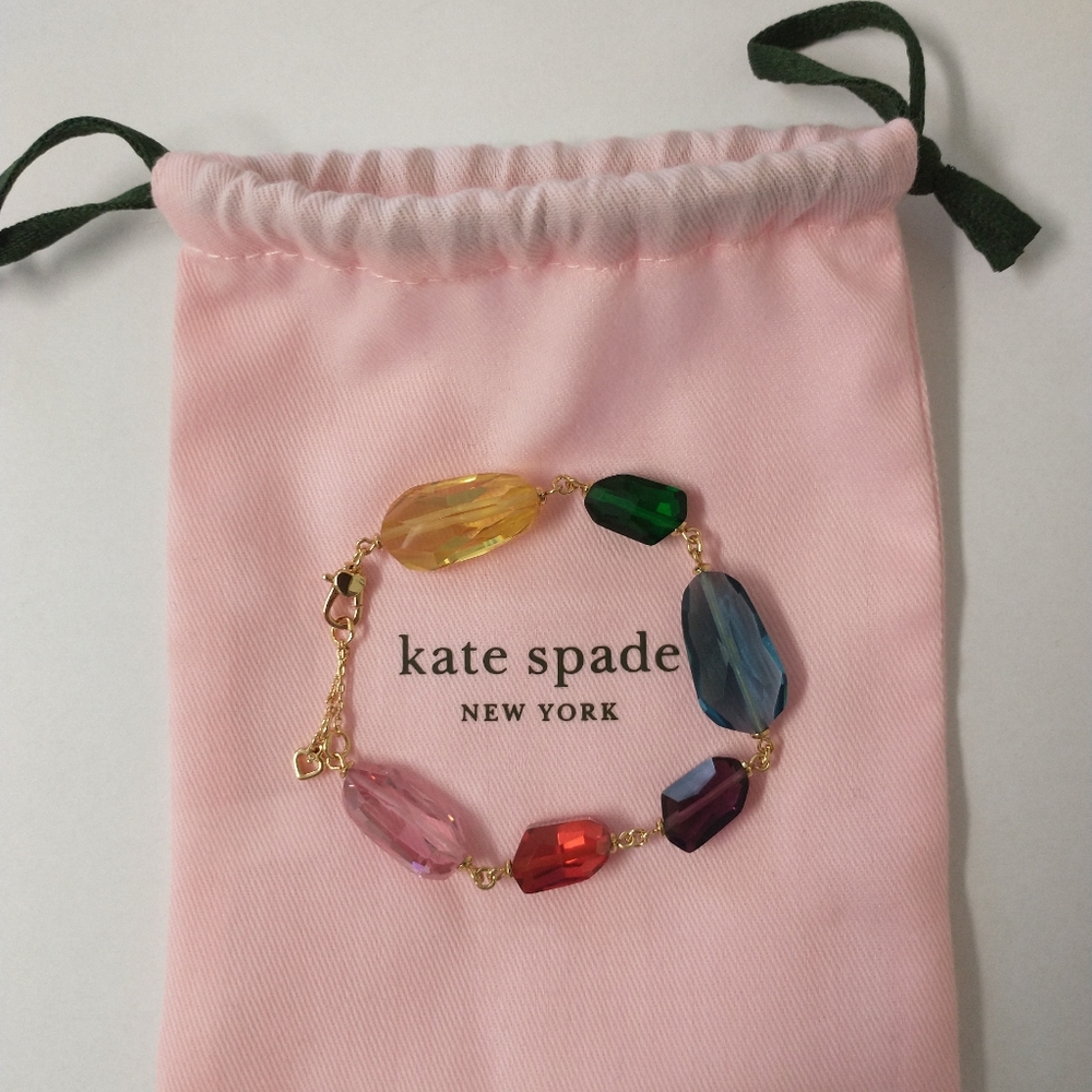 Kate Spade New York Treasure Trove bracelet and pink bag